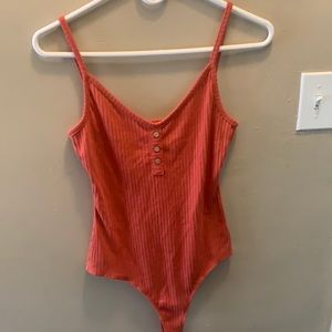 Salmon bodysuit. Ribbed. Never worn.